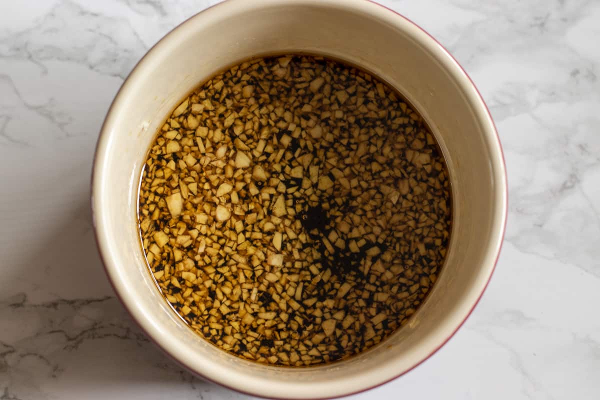 the ingredients for the marinade are placed in a bowl