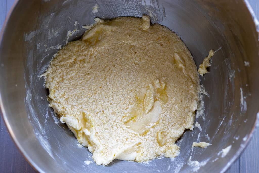 Eggs are added to the butter and sugar mixture.
