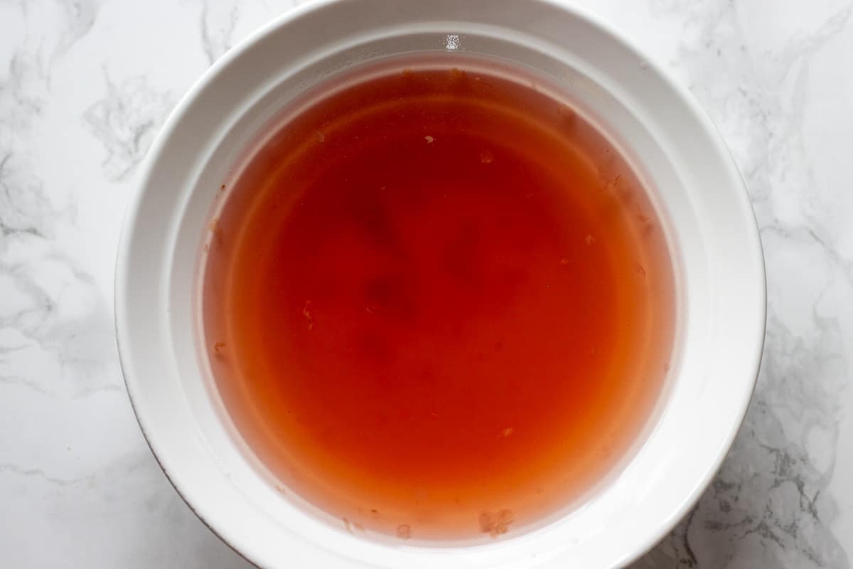 strawberry syrup made with strawberry jam, water, balsamic vinegar and liquor