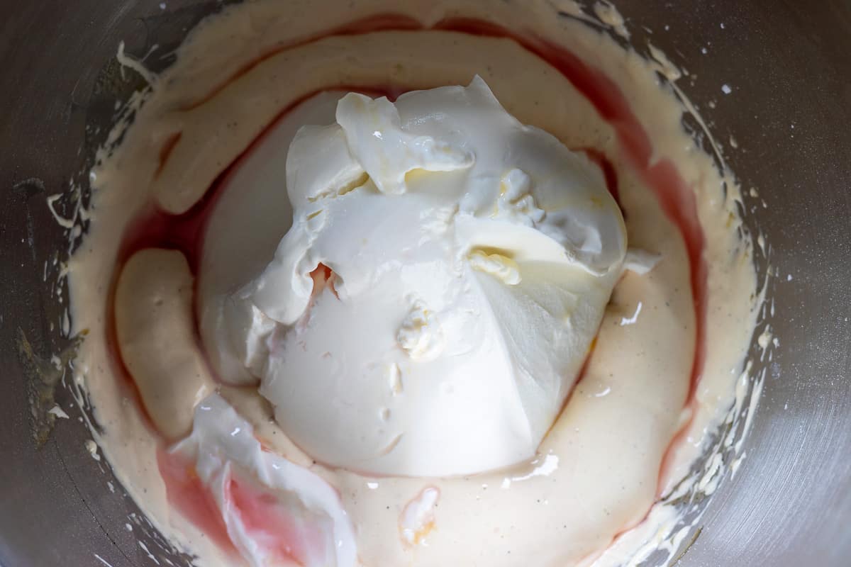 mascarpone mixture and strawberry liquor are added to whipped egg whites