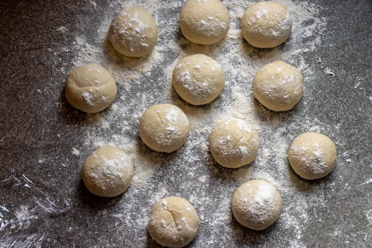 the dough has been divided into 12 balls