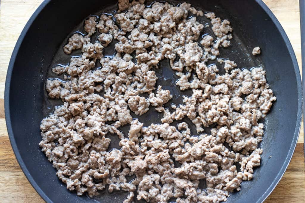 Browning ground meat in a pan.