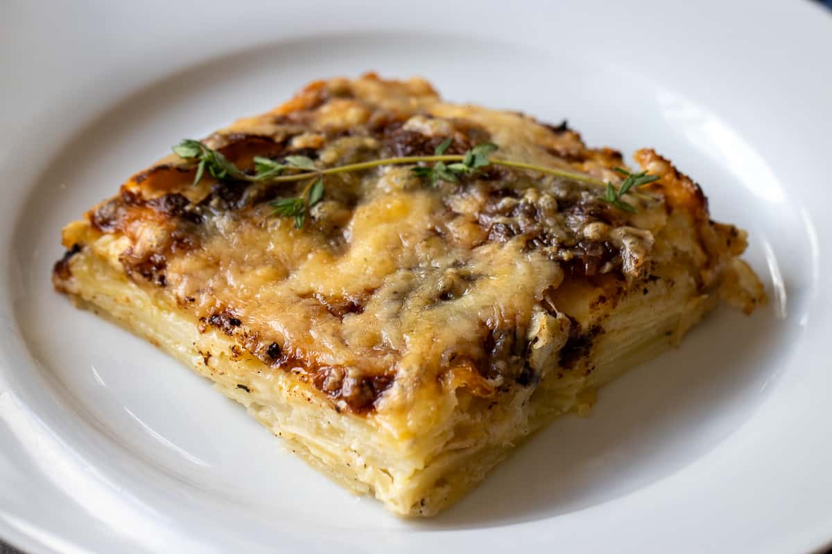 a slice of gratin dauphinoise potatoes