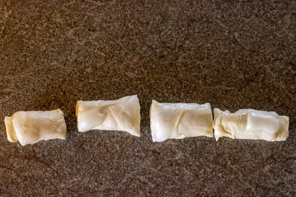 the log is cut into 4 equal pieces