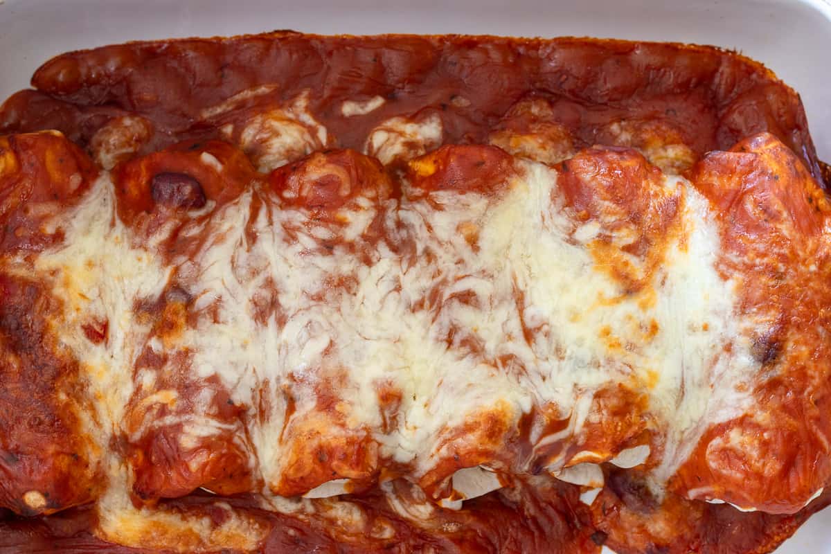 wet burritos are baked until the cheese has melted