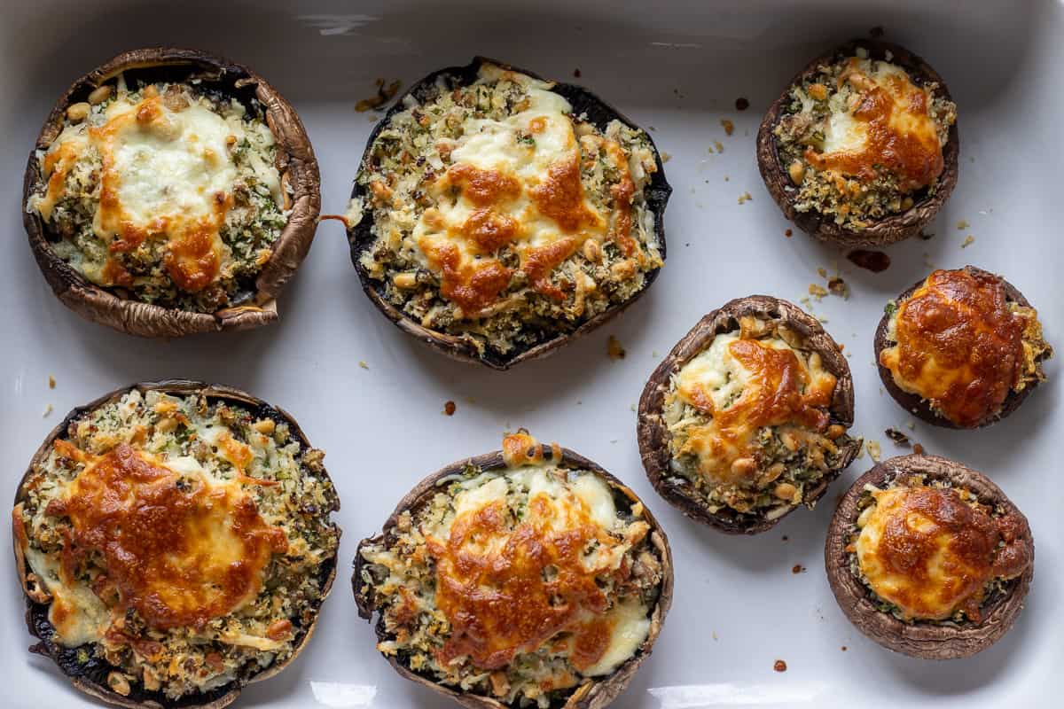 vegetarian stuffed mushrooms are baked until golden brown