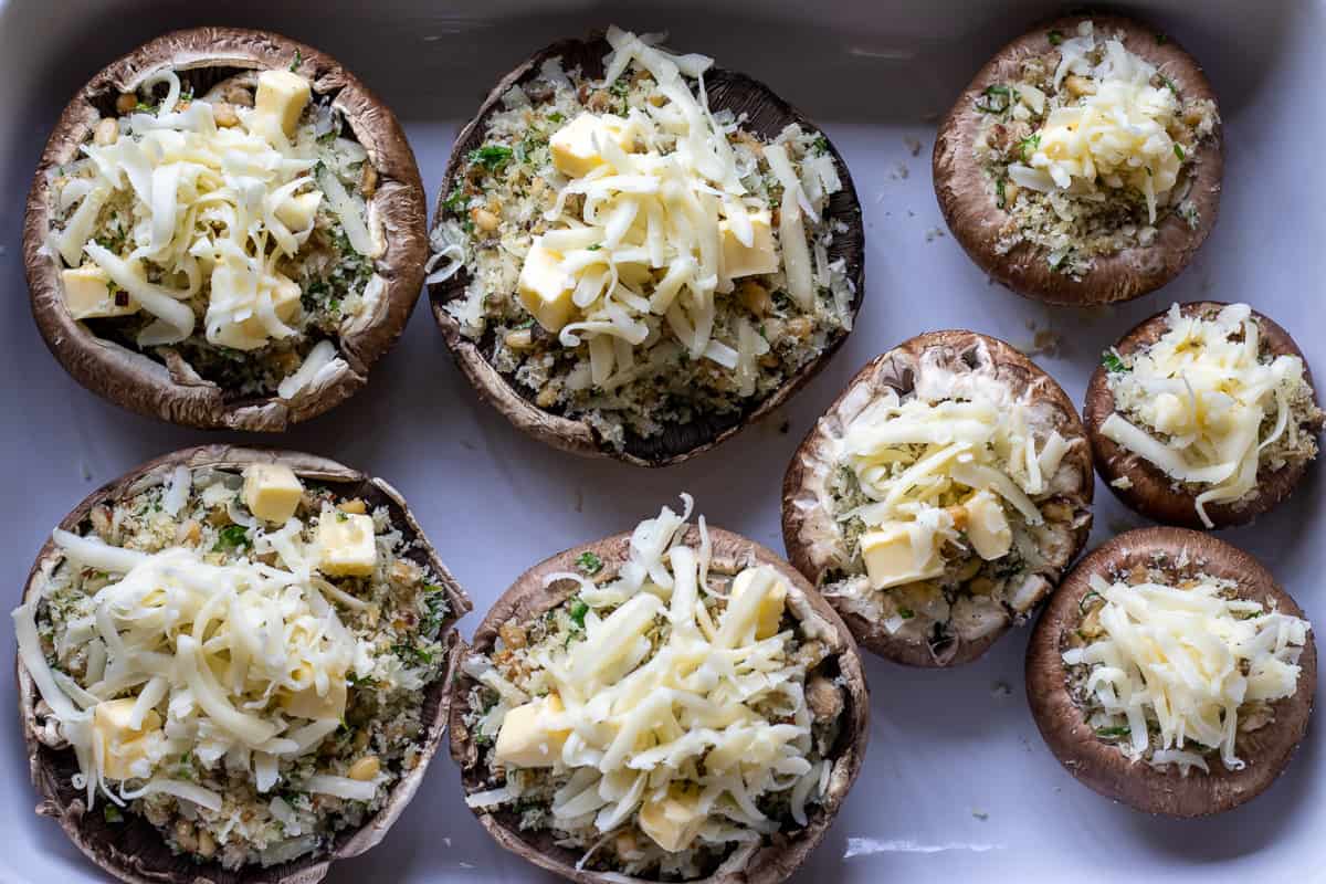 grated cheddar sprinkled on stuffed mushrooms