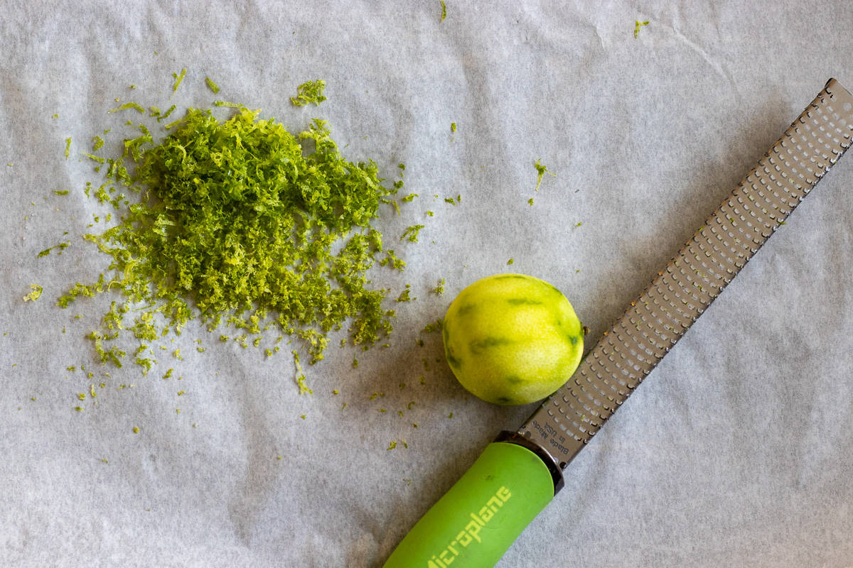 zesting a lime using a microplane