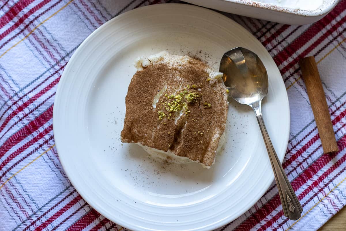 a portion of tavuk gogsu is served with a spoon