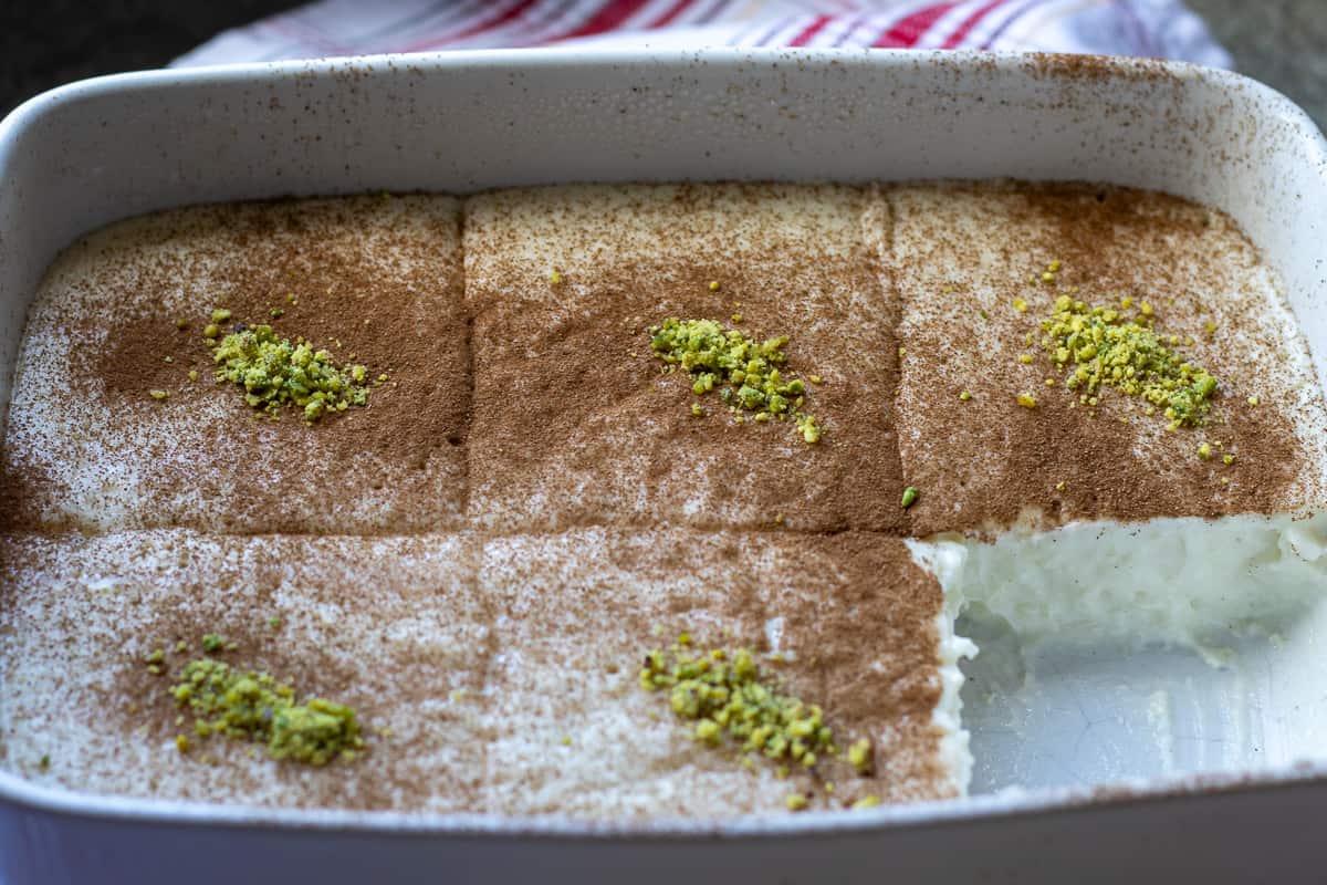 Tavuk göğsü pudding is portioned, and a serving has been taken out.