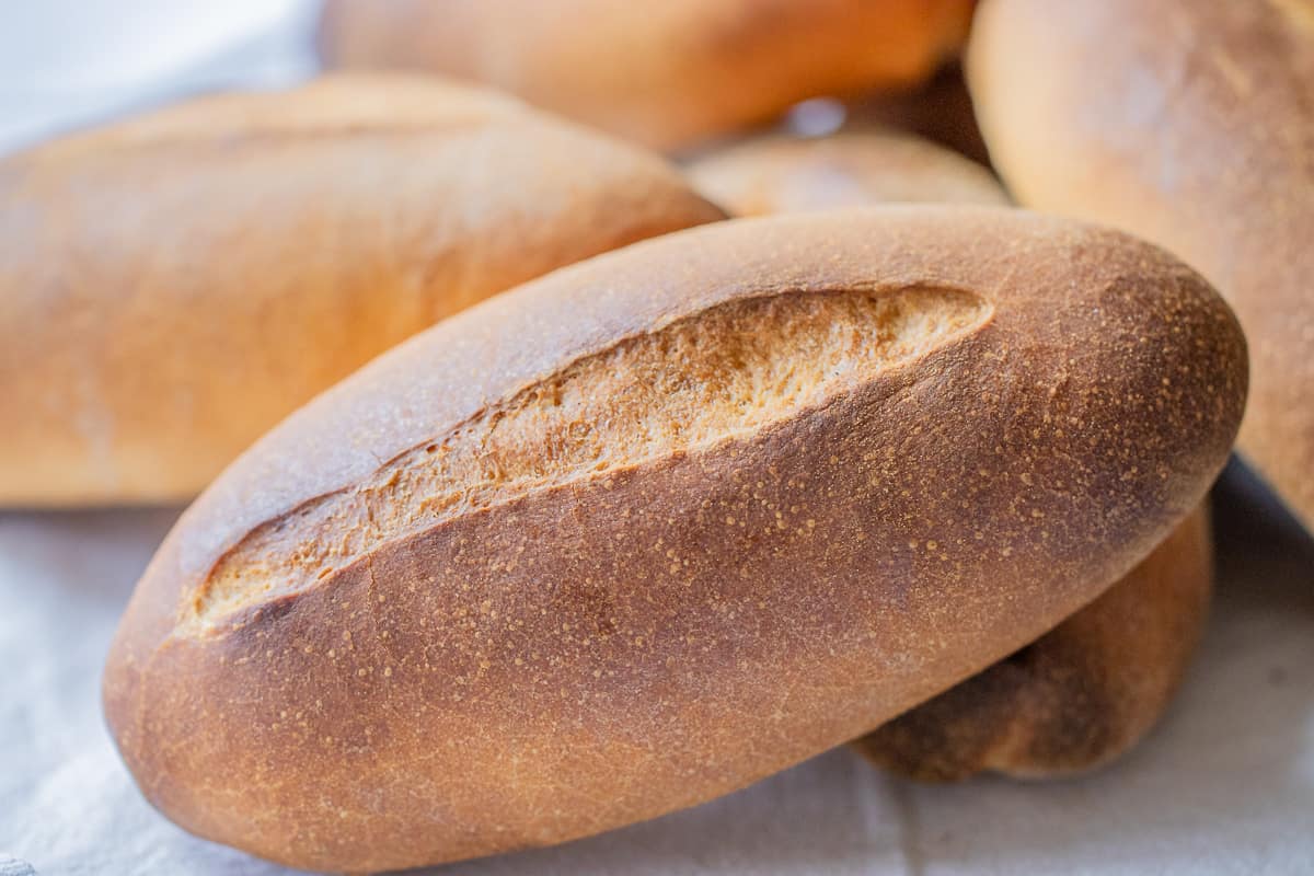 a piece of bolillo bread roll