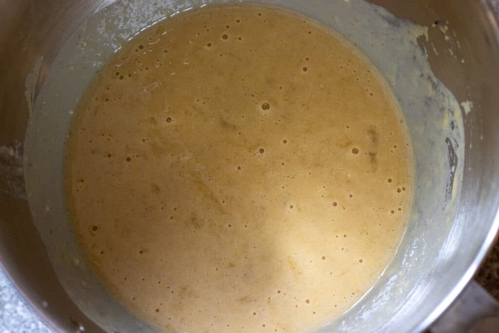 banana, pumpkin, oil, and yogurt are added to egg mixture