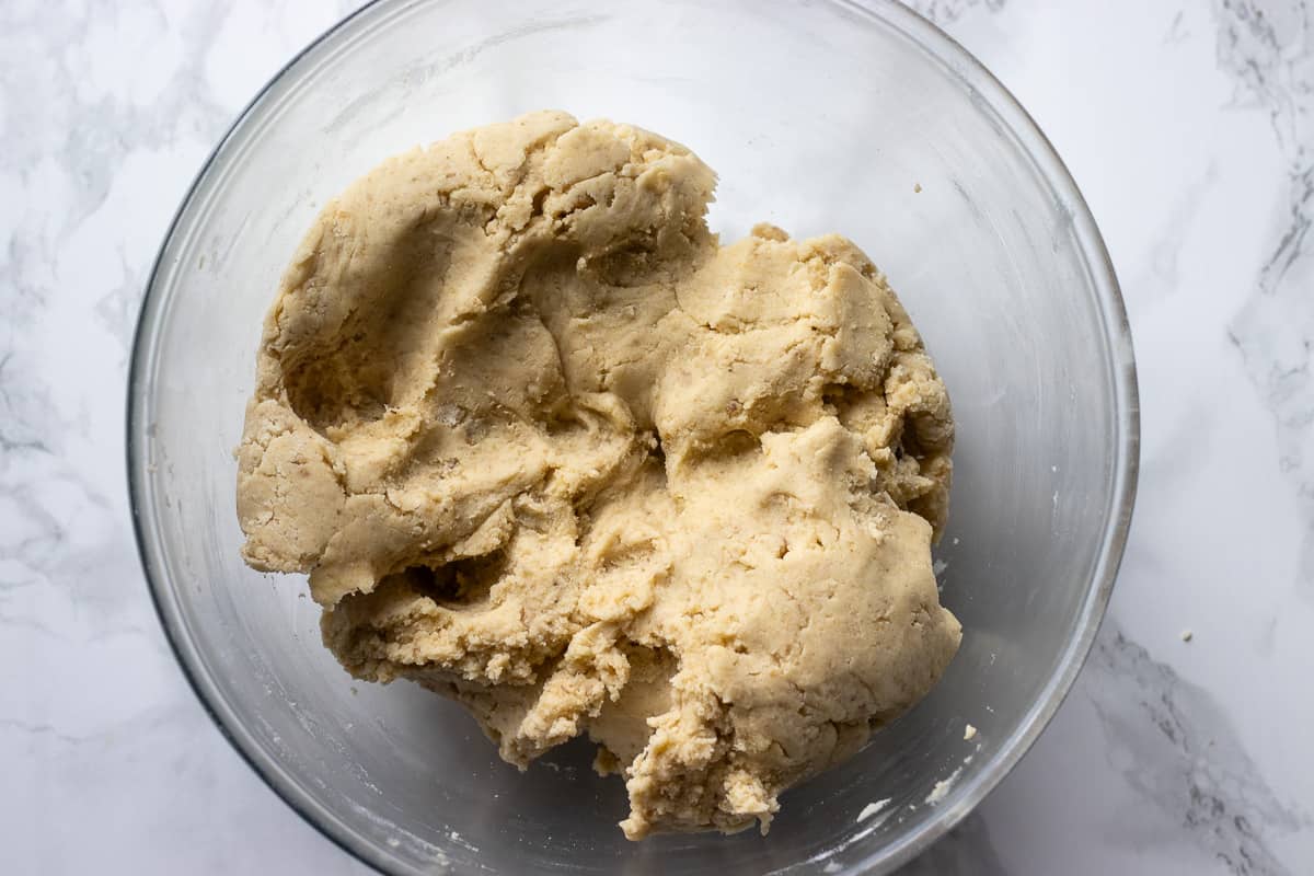 the dough for walnut cookies in a bowl