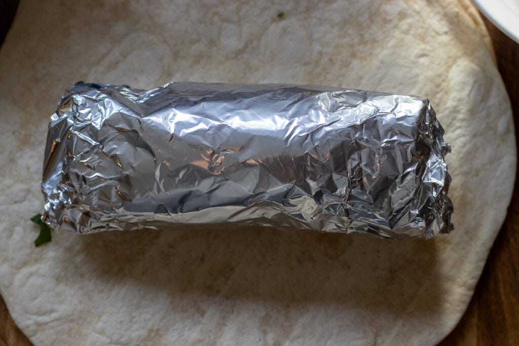 burrito is wrapped in tin foil