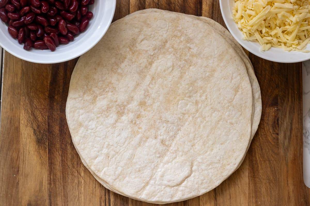 tortilla wrap is placed on a clean surface for making burritos