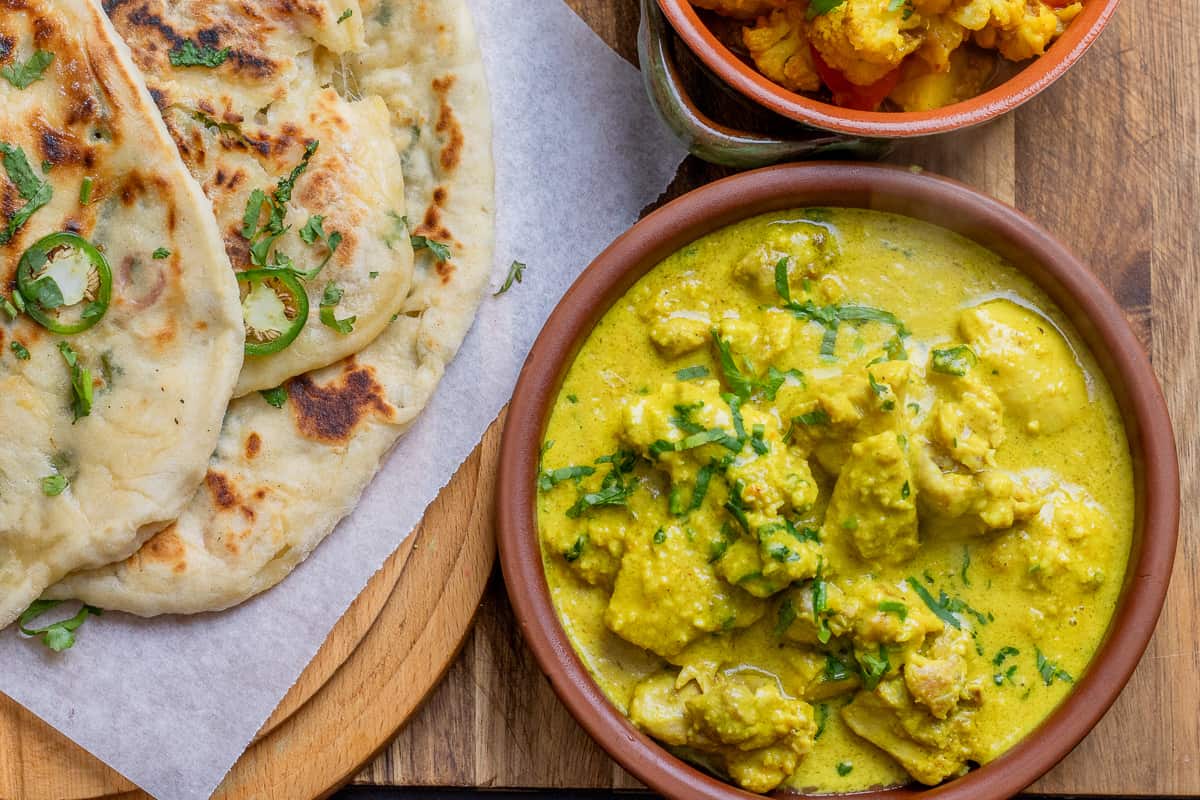 creamy chicken korma served with bullet naan