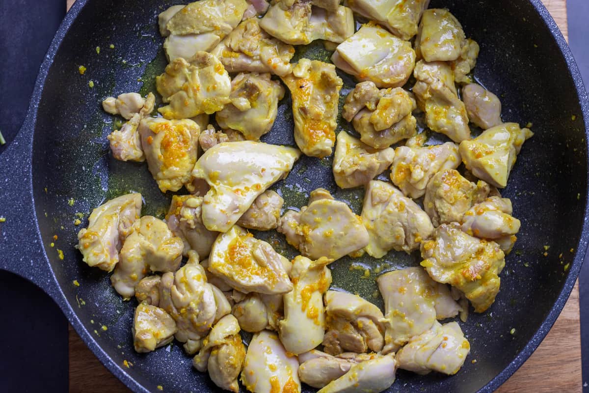 sautéing chicken pieces in ghee