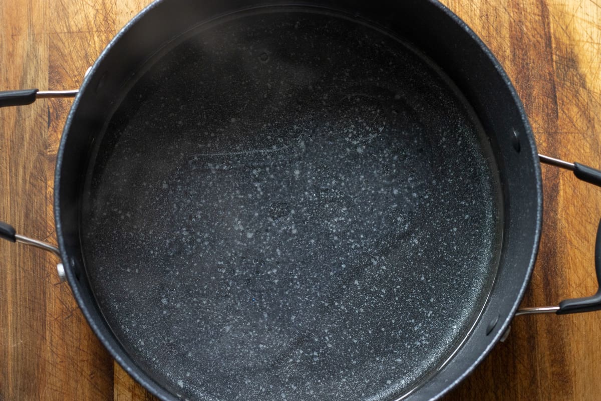 boiling water and oil in a saucepan