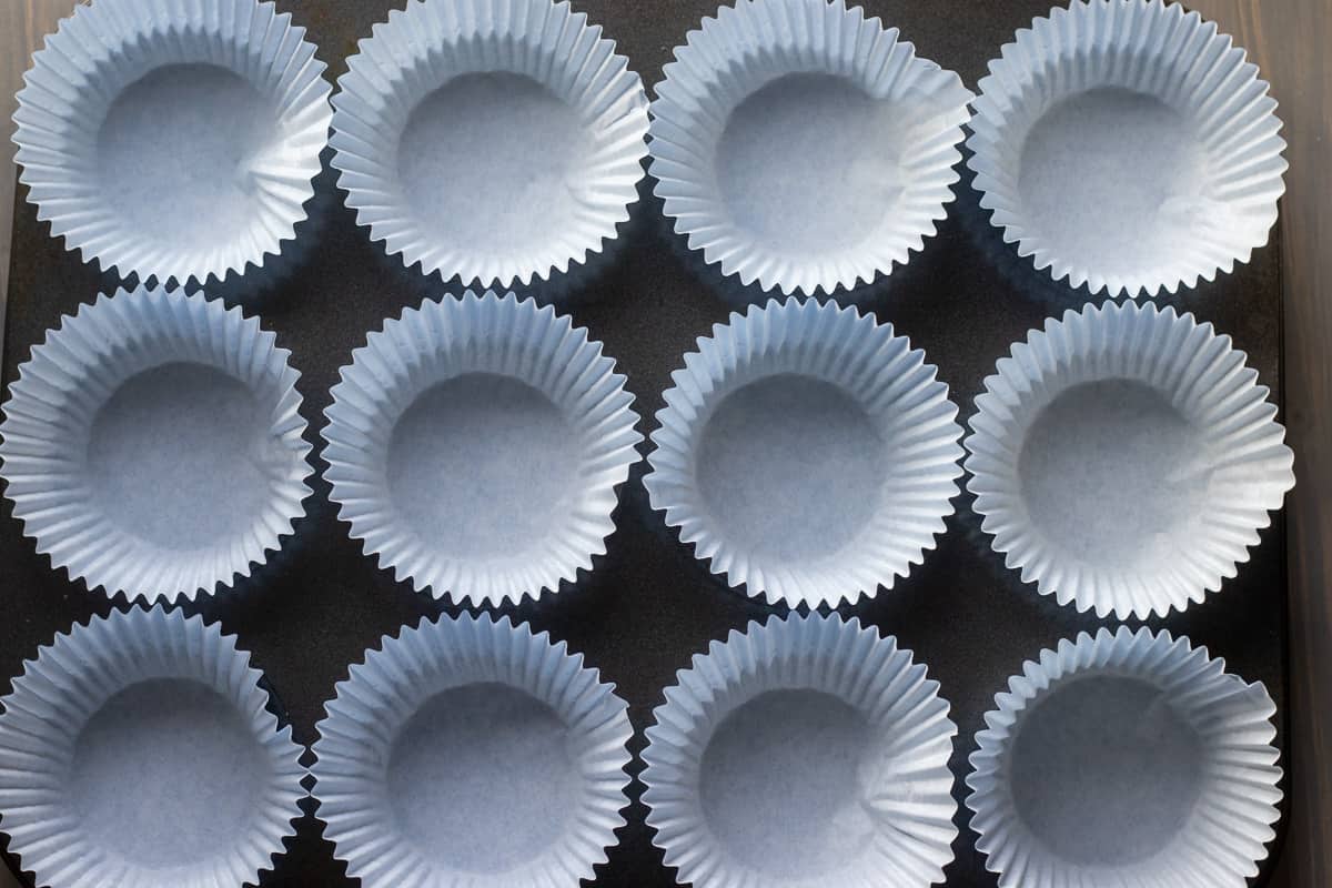 muffin tin is lined with muffin papers