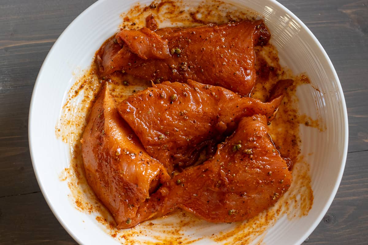 turkey tenderloins are covered with marinade