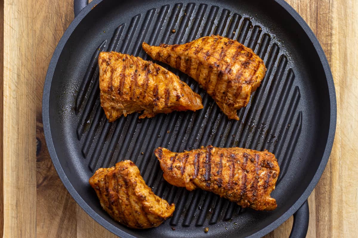4 pieces of turkey tenderloins are seared