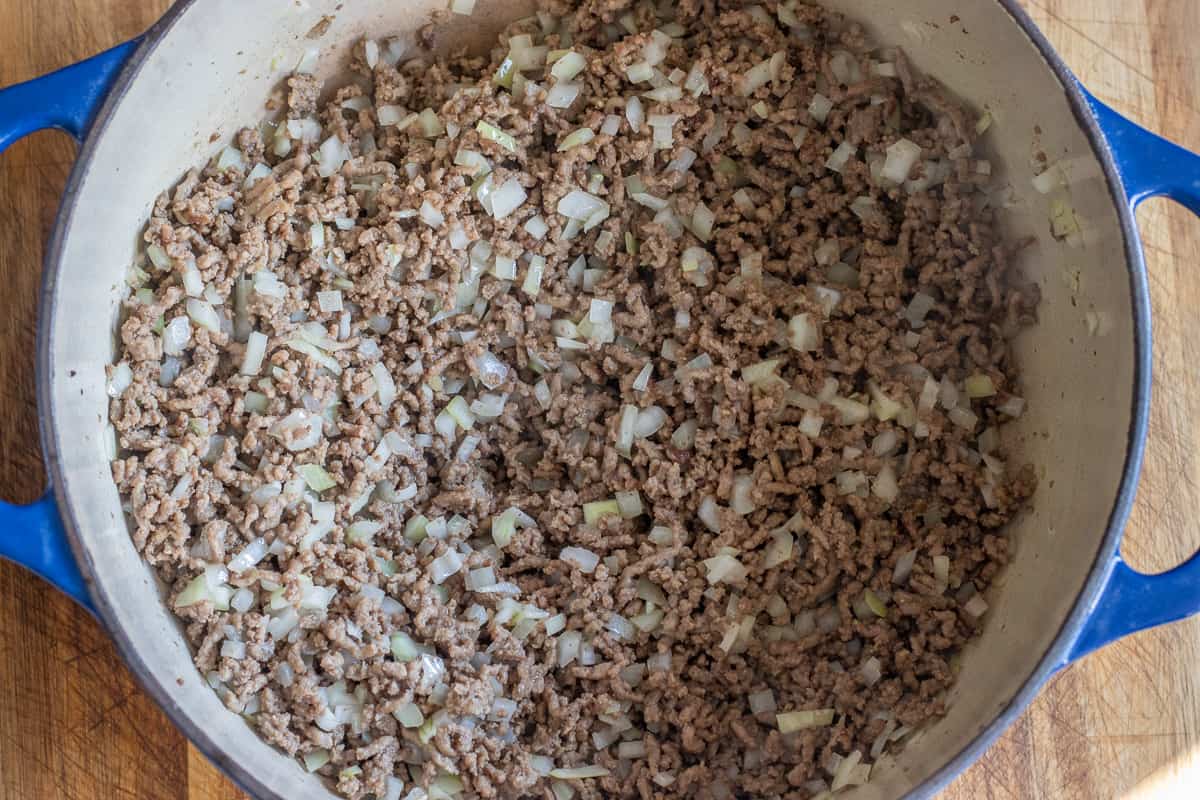 sautéing the onions and garlic in dutch oven