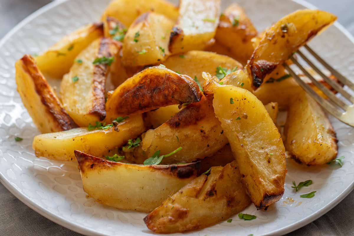 green roasted potatoes served on a plate