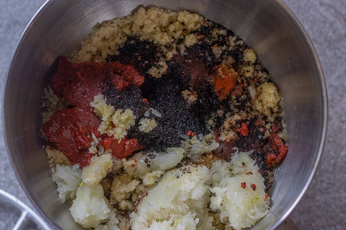 The ingredients are added to a fine bulgur mixture.