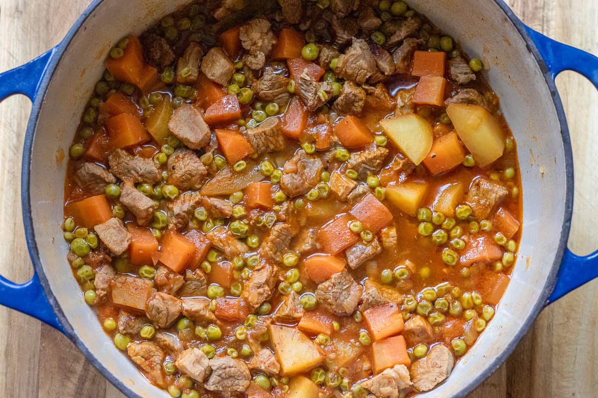 pea stew is cooked until the meat and vegetables are softened