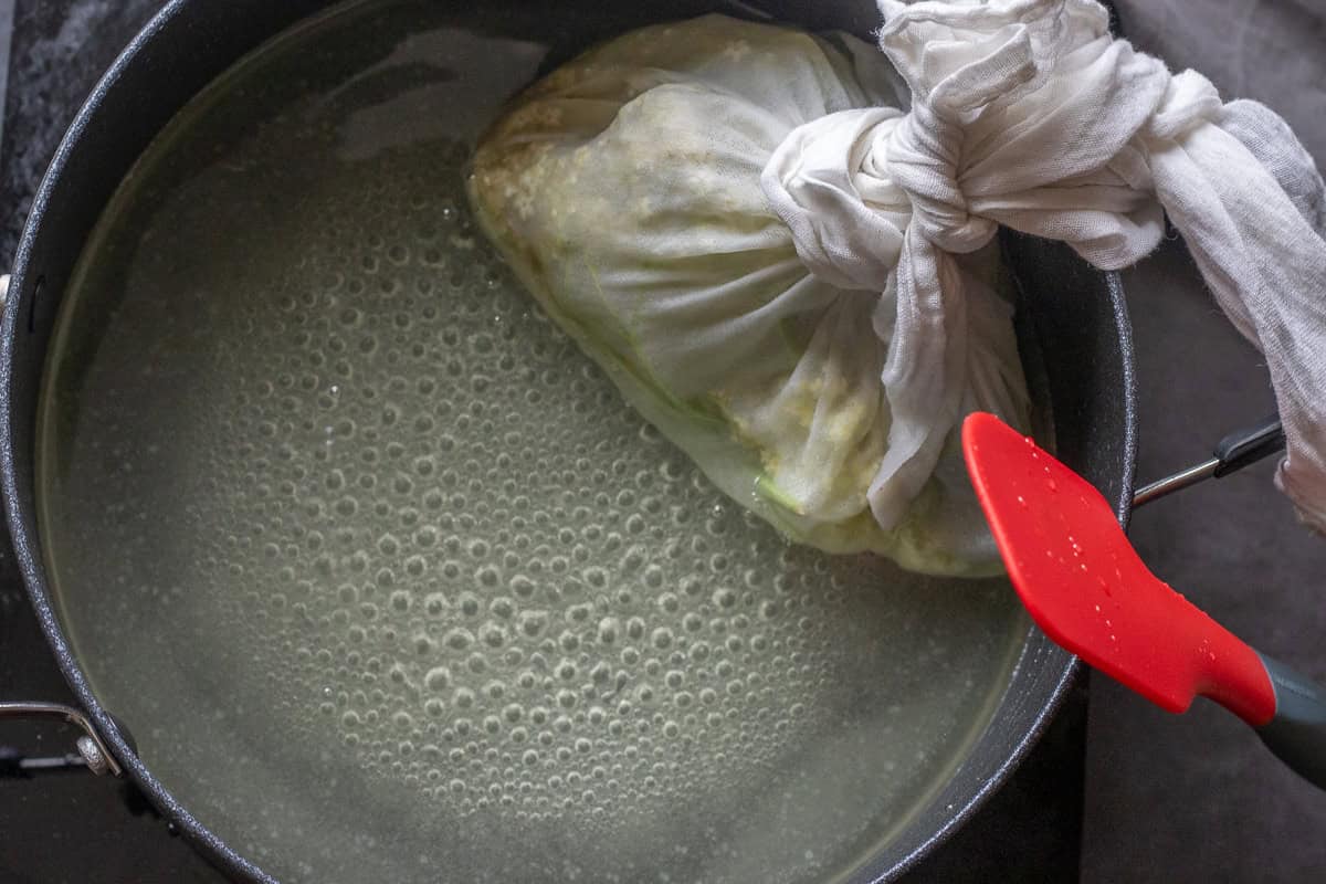 elderflower bag placed in pan along with water and sugar