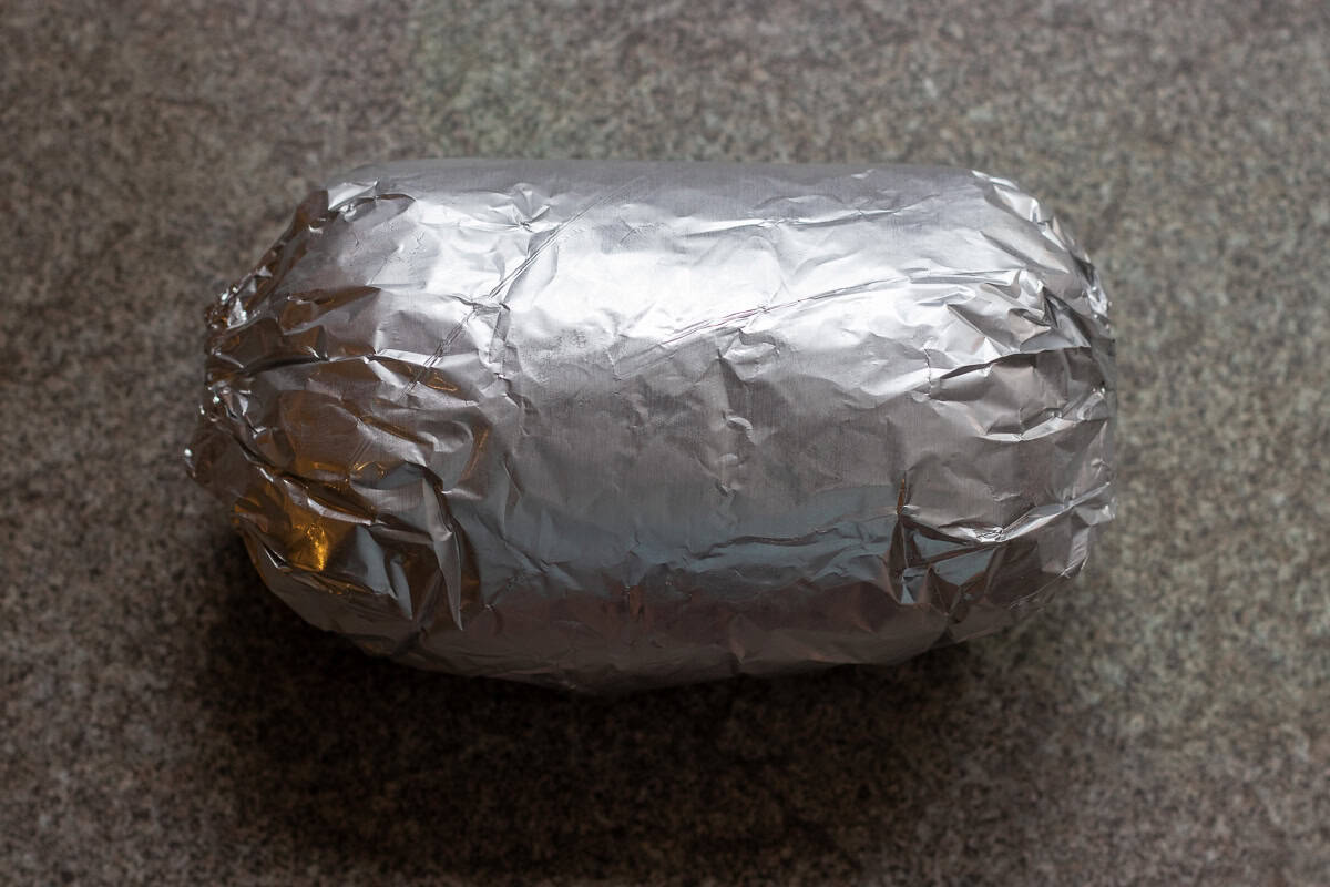 doner kebab tightly wrapped in foil
