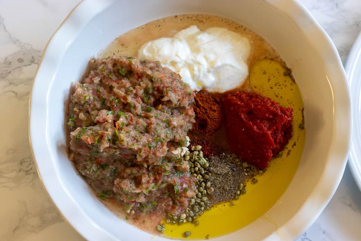 marinade ingredients for chicken Doner Kebab are placed in a bowl