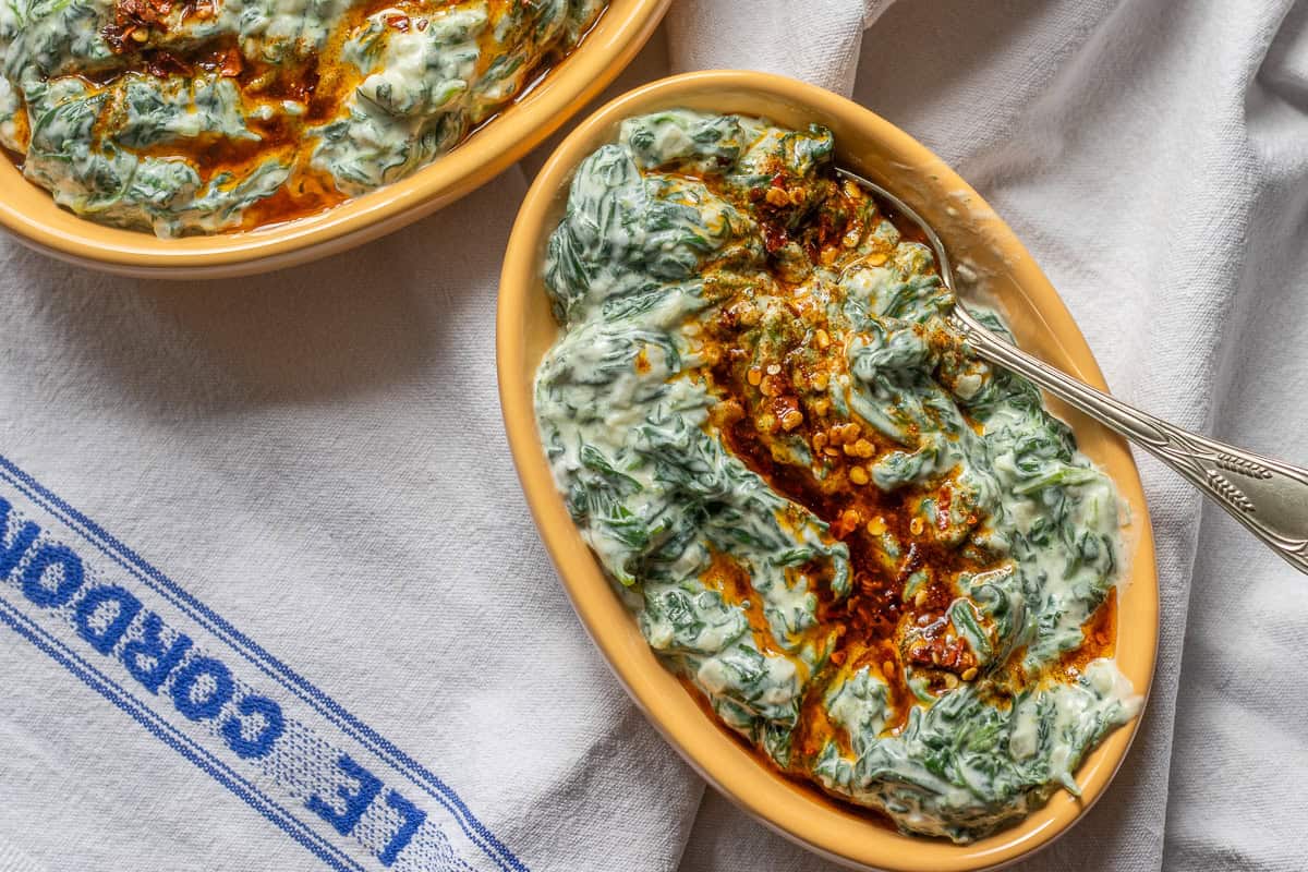 ispanak born served with a drizzle of chili oil