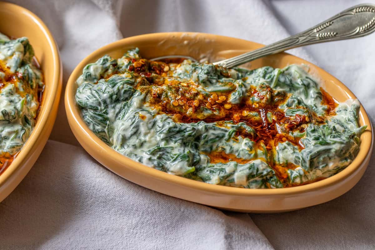 borani dip served with a drizzle of chili oil
