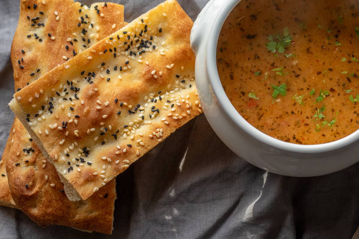 Barbari bread served with a bowl of Tarhana soup