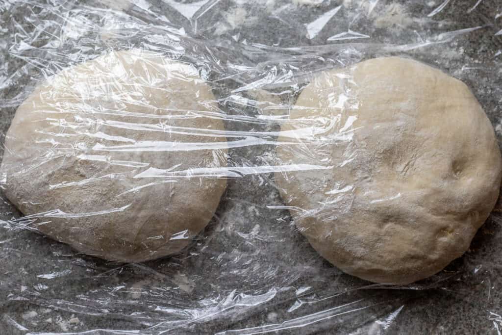 barbari bread dough cut in 2 equal pieces