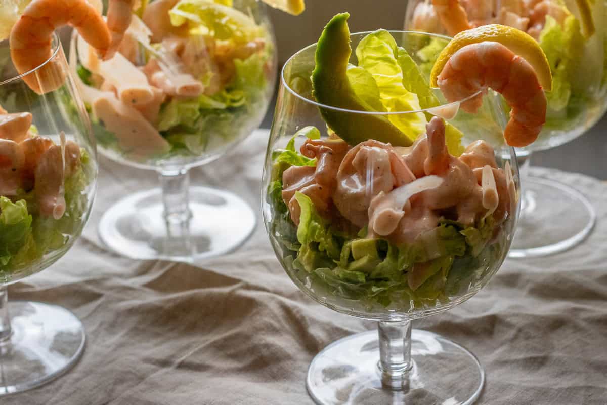 prawn cocktail with avocado served in a glass