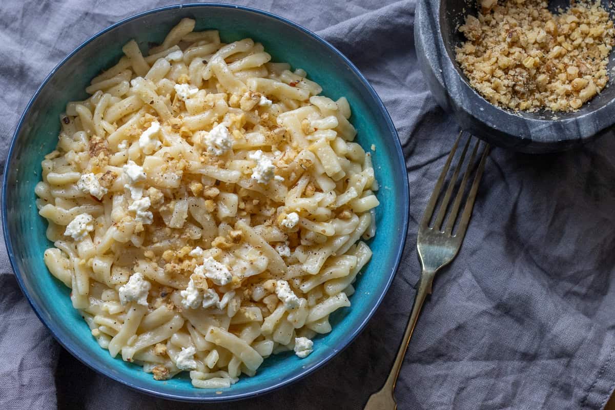 Turkish egg noodles served with crushed walnuts
