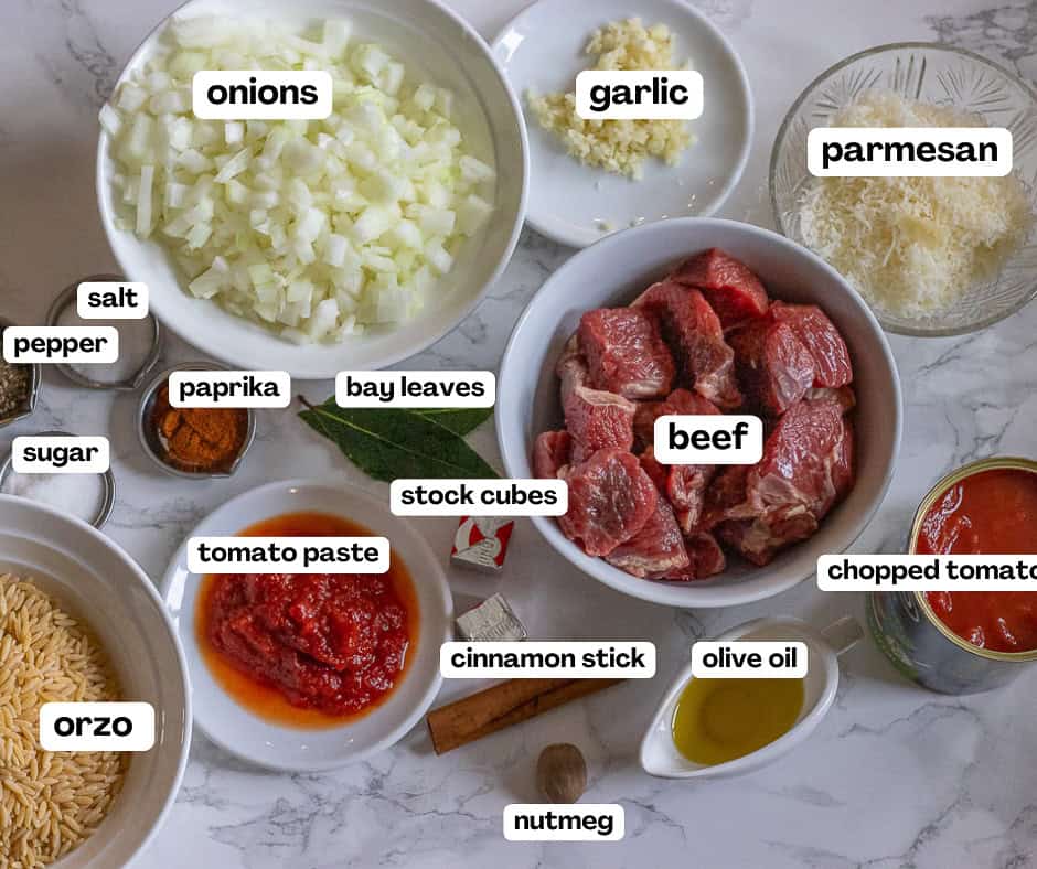labelled picture of ingredients for greek beef and orzo stew youvetsi