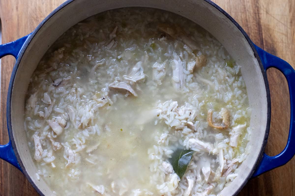 Shredded chicken added to the pot.