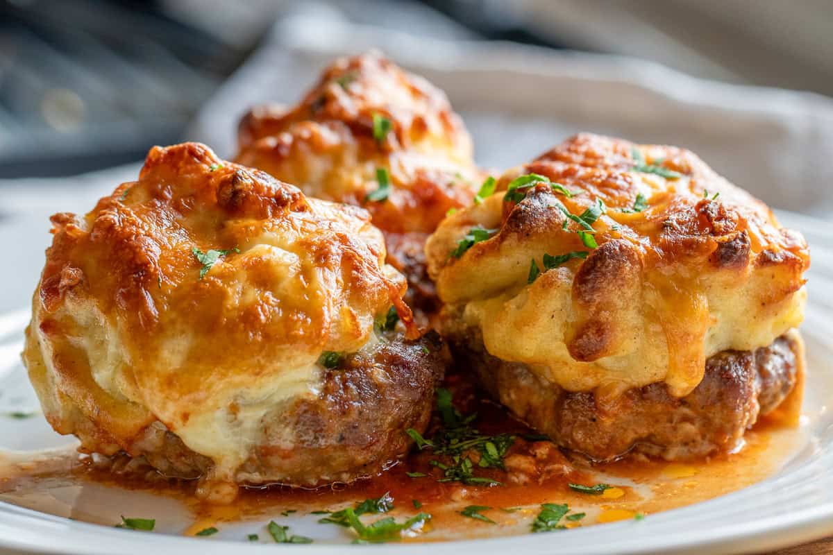 3 pieces of hasanpasa kofte served on a plate