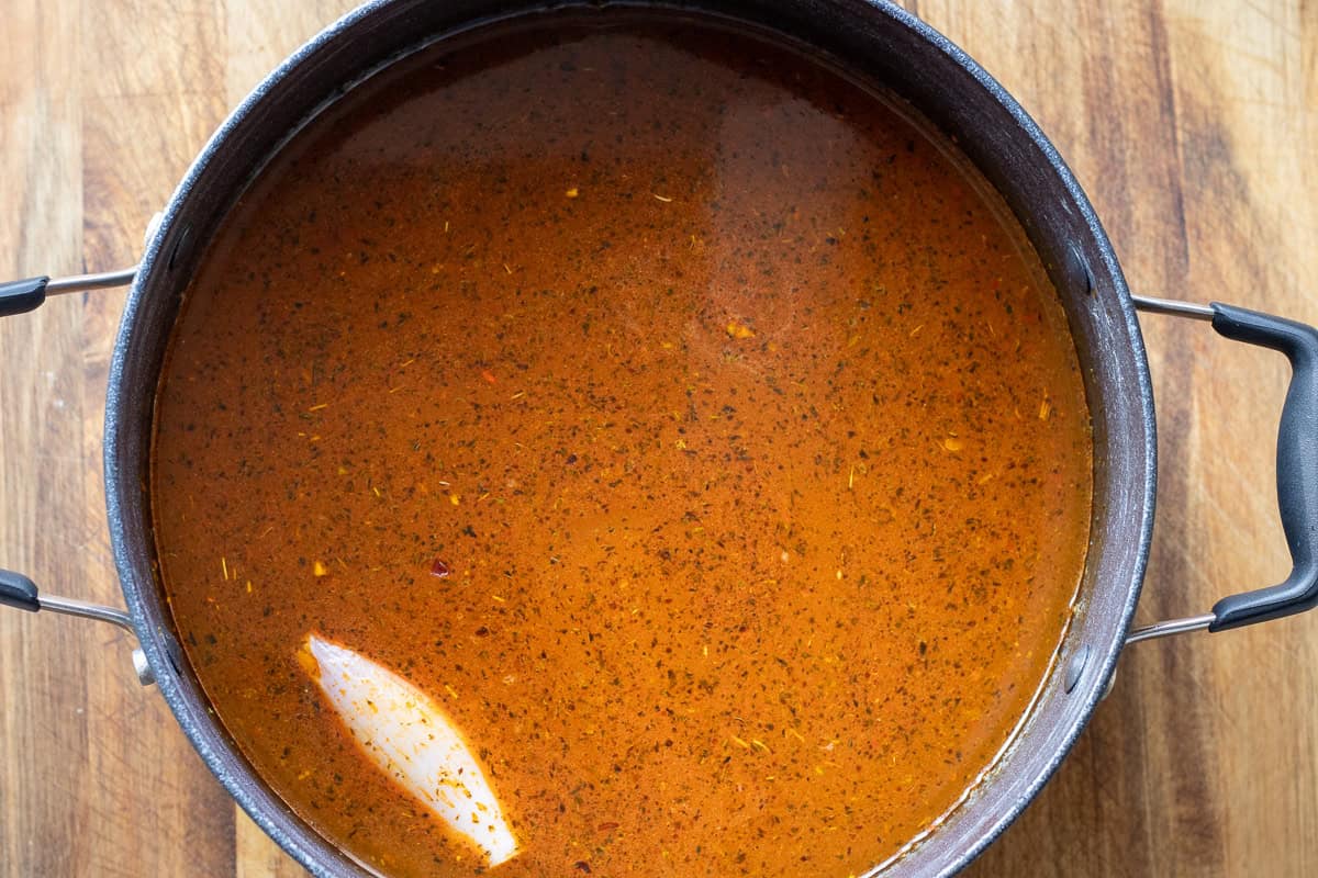 the stock and orzo are added to the pot
