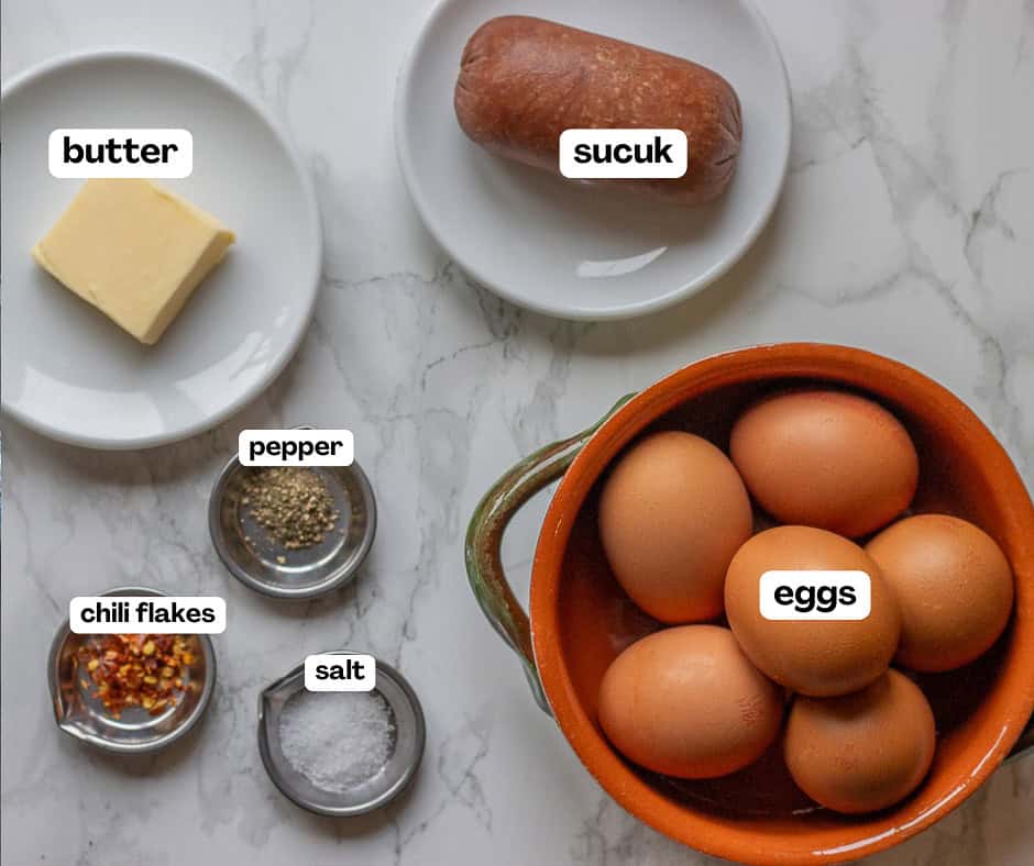 labelled picture of ingredients for Sucuklu yumurta- Turkish sausage and eggs recipe