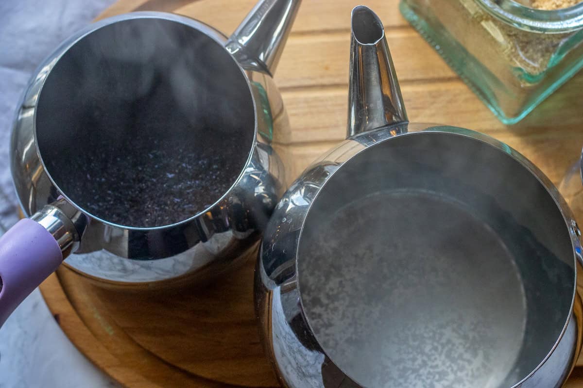 boiling water pored over tea leaves