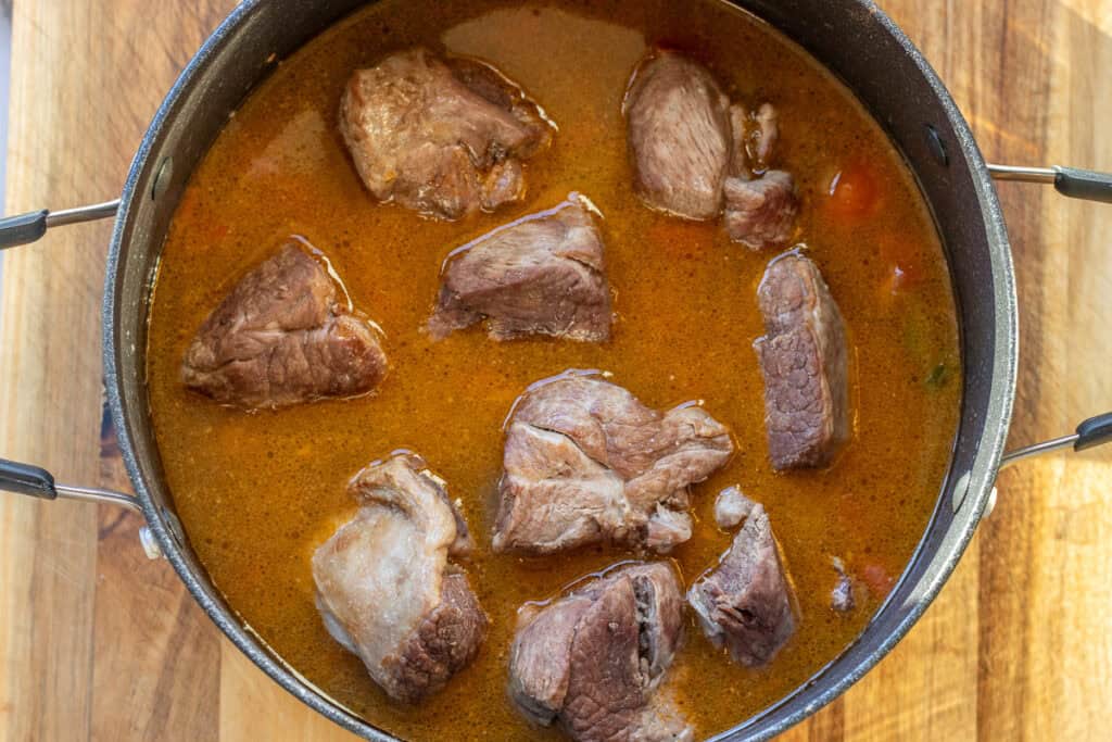 lamb pieces are placed in a pot