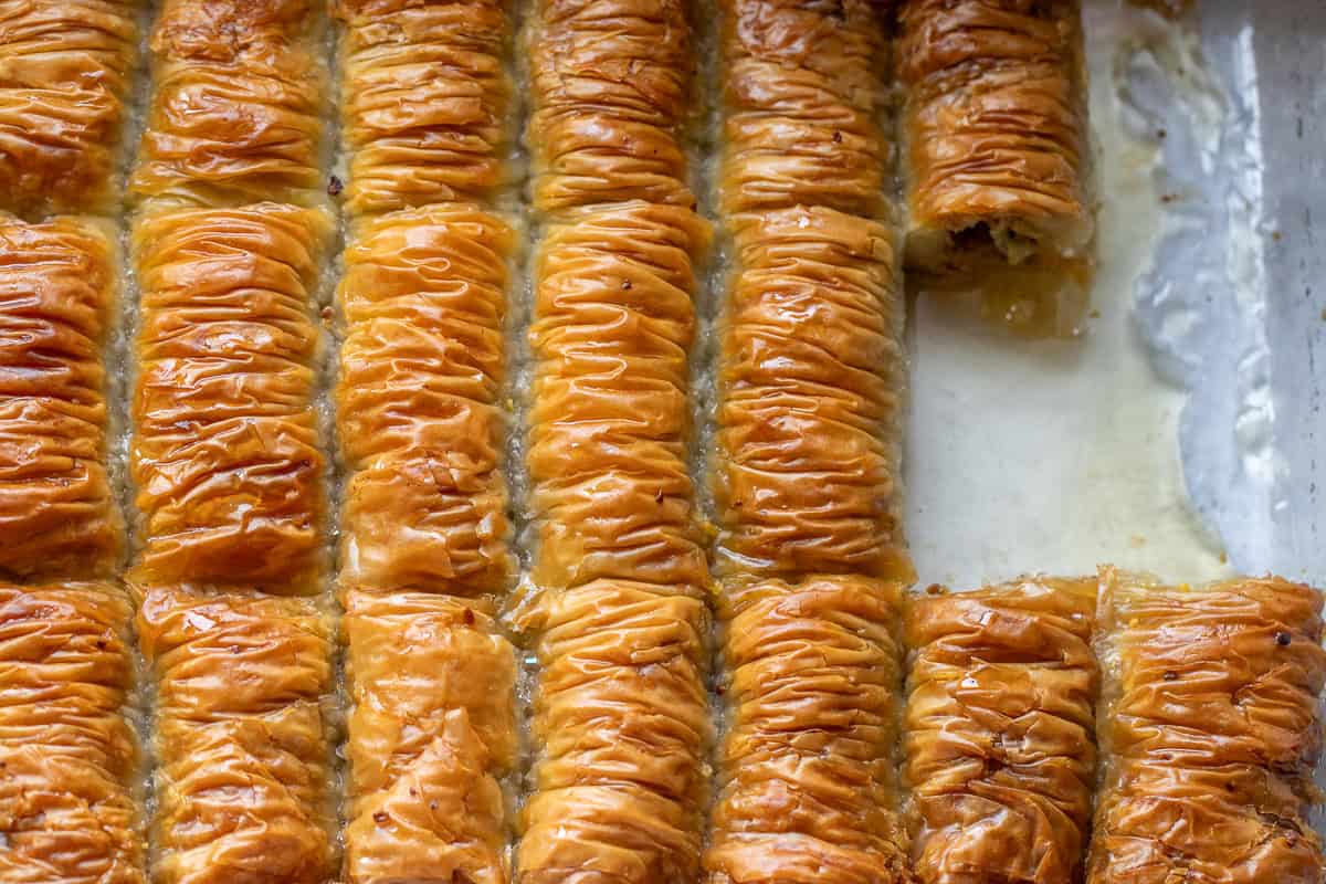 baklava rolls are served after soaking in syrup overnight
