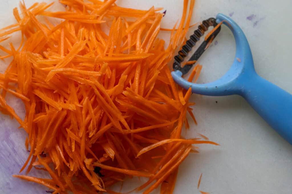 shredded carrot with a Thai peeler