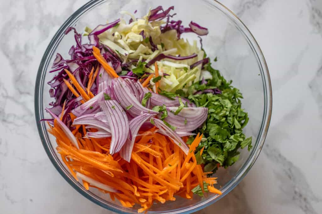 chopped veggies are placed in a bowl