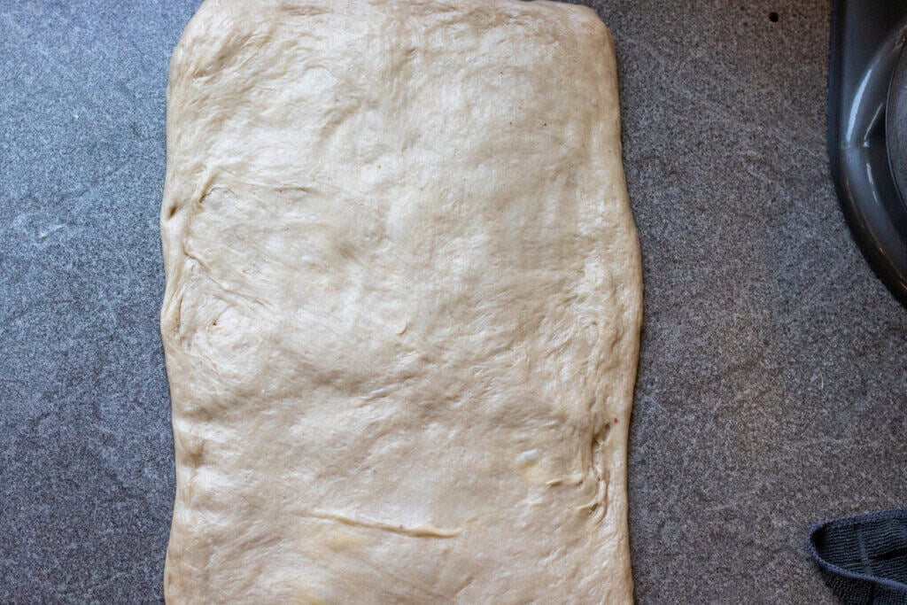 the dough is folded and flatted second time