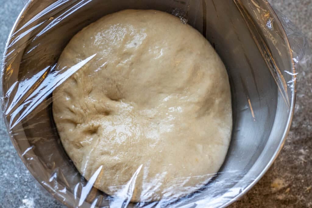 the dough is placed in a bowl for rising